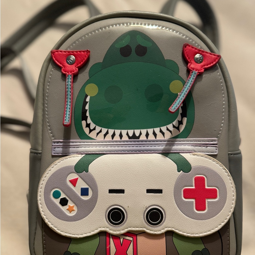 Loungefly Disney/Pixar TRex backpack